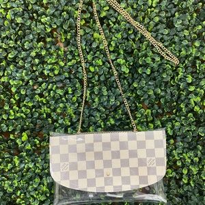 Crossbody stadium bag with repurposed materials (PVC bag)